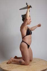 KAROLINA KNEELING WITH SWORD